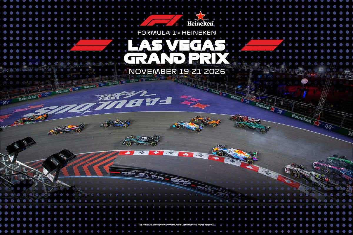 Formula 1 cars race through a nighttime Las Vegas street circuit during the FORMULA 1 HEINEKEN LAS VEGAS GRAND PRIX, with event branding visible on the track and screens.